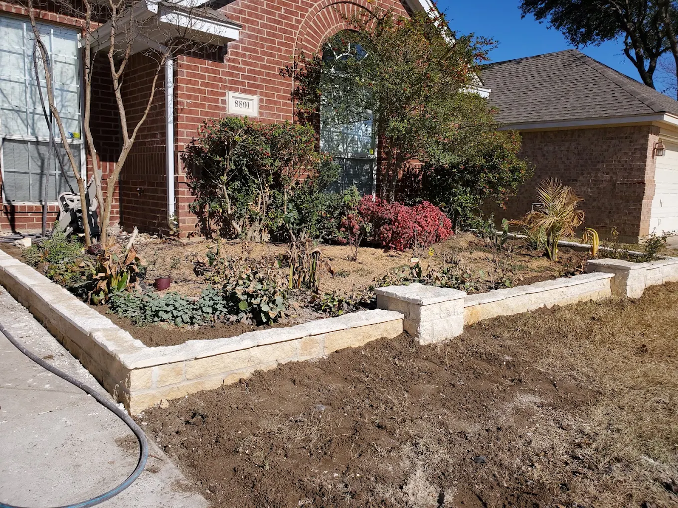 Landscape beds being refreshed